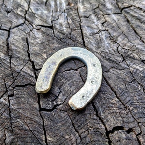 Medium-sized mini horseshoe, hand-forged