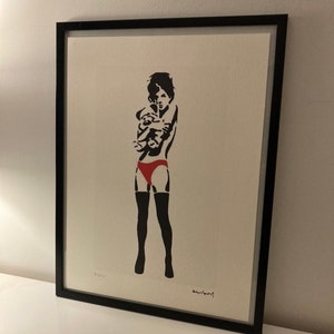 BANKSY: lithograph framed and numbered by hand with a certificate