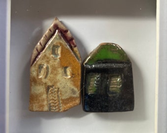 Framed Little ceramic houses