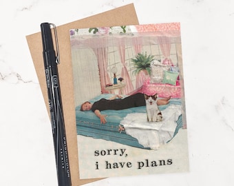 May include: A vintage-style card with a collage of a woman lying on a bed with a cat sitting on the bed. The text on the card reads "sorry, i have plans".
