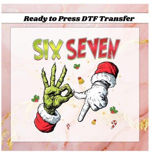 May include: A DTF transfer design featuring two hands, one green and one white, forming the numbers six and seven. The green hand is wearing a red Santa hat and the white hand is wearing a white glove and a red Santa hat. The words "SIX SEVEN" are in green and red. The text "Ready to Press DTF Transfer" is at the top.