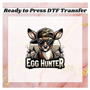 May include: A cartoon deer wearing sunglasses and a camouflage baseball cap. The deer is wearing a leather jacket and has a forest background. The text "Egg Hunter" is below the deer.