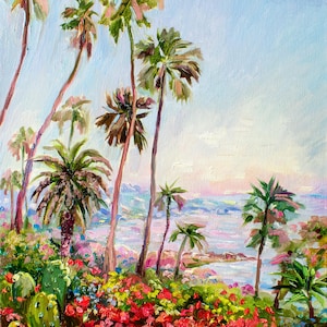 May include: An oil painting depicts a coastal scene with palm trees and vibrant flowers. The artwork features a blue sky, a body of water, and a foreground filled with red, yellow, and green flora. The artist's signature is in the lower right corner.