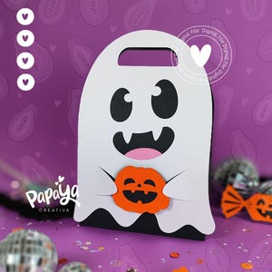 May include: A white ghost-shaped gift bag with a black mouth and eyes, holding an orange pumpkin. The bag has a handle and a wavy bottom edge. The background is purple with papaya and heart shapes.