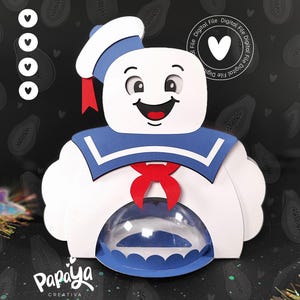 May include: A white and blue 3D papercraft box shaped like a ghost wearing a sailor hat and a red bow tie. The box has a clear plastic window in the front and the text "Digital File" is repeated around the edge of the image.