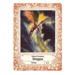 May include: A rectangular game card featuring a watercolor illustration of a red dragon in flight against a dark, stormy sky. The border is a light orange with a white floral pattern. Text reads Token Creature Dragon, Flying, and 4/4.