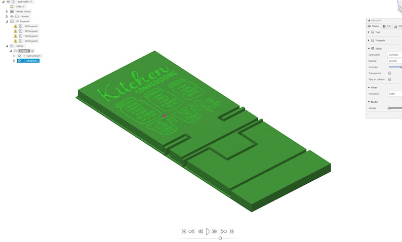 May include: A green 3D printed kitchen organizer with the text "Kitchen Conversations" and a design of jars with labels.