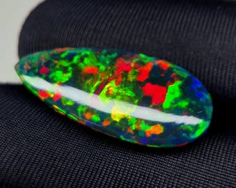Multi-Fire Black Opal Cabochon: Regnbågsfärgad, prålig eldsten, 11,20 ct