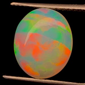 Ethiopian Opal Cabochon: Natural White Fire Gemstone, Oval, 13x11mm, 4 Cts