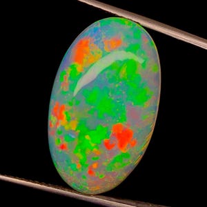 Natural Ethiopian Opal Cabochon: 11.20 Carat Oval Gemstone
