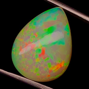 12.80 Carat Ethiopian Welo Opal Cabochon: Multicolor Fire Gemstone