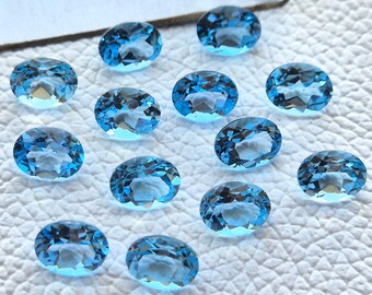 Swiss Blue Topaz Gemstone: Oval Cut, Faceted Crystal Birthstone