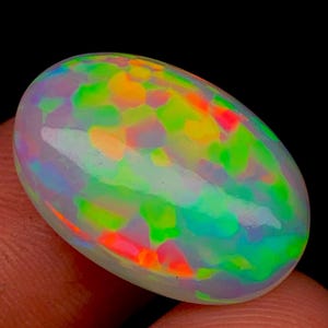 Natural Ethiopian Opal Cabochon: Galaxy Fire Dragon Gemstone (21x14 MM)