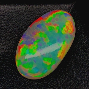Natural Ethiopian Opal Cabochon: 6.70 Carat Oval Gemstone