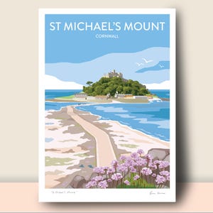 May include: A print of St Michael's Mount in Cornwall, England, featuring a castle on a green island connected to the mainland by a causeway. The sky is blue with white clouds and birds. Pink flowers are in the foreground.