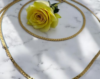 14k Gold Serpentine Necklace 20 in, 1.1mm thickness. 4.66g