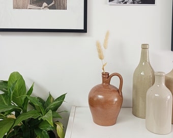 Pitcher, jug in glazed brown stoneware, vintage