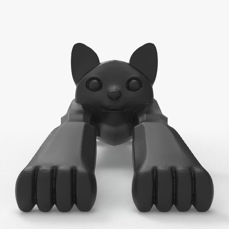 May include: A black, stylized cat figurine in a crawling pose. The cat has large paws, a small nose, and pointed ears. The figurine is made of a smooth, glossy material and is set against a white background.