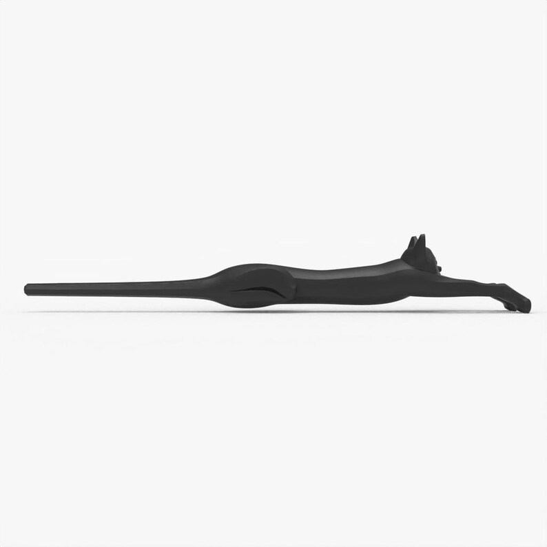 May include: A black cat-shaped bottle stopper. The stopper is in a running pose, with its body elongated and its legs extended. The cat's head is upright, and its tail is straight. The stopper is made of a solid, dark material.