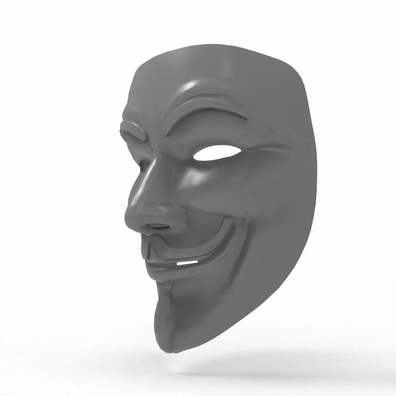 May include: A gray plastic mask with a smiling face, featuring a prominent nose, a curved mustache, and an oval eye opening. The mask is a side profile view, set against a white background.