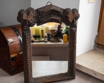 Antique wall mirror in tramp art frame Handcrafted rustic wooden frame Collectible folk art
