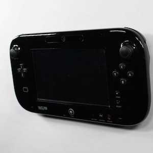 Soporte de pared para mando de Wii U