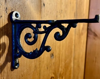 Small cast iron shelf bracket