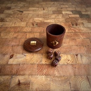 wooden dice with inlayed metal wooden shaker and lid