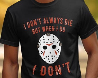 May include: Black t-shirt with a white hockey mask graphic and the text "I don't always die but when I do I don't".