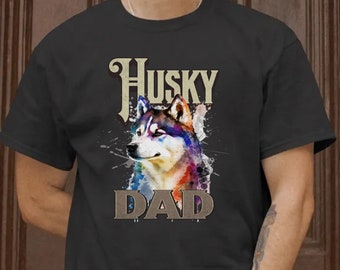 May include: A black t-shirt with a watercolor illustration of a husky dog and the text "Husky Dad".