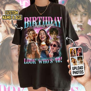 Op de afbeelding: Zwart T-shirt met een gepersonaliseerd verjaardagsontwerp. Het shirt toont het woord "BIRTHDAY" in roze en blauw, de naam "Jessica's 40th" en de zin "LOOK WHO'S 40!". Het ontwerp bevat meerdere foto's.