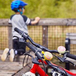Cute bike bells on the handlebars

cute bike accessories - bicycle accessory - bike rider gift - gift for bike rider - birthday gift - bicycle bell - Cute Things Seattle bike bell - cycling gifts, holiday gifts, wheelchair accessories