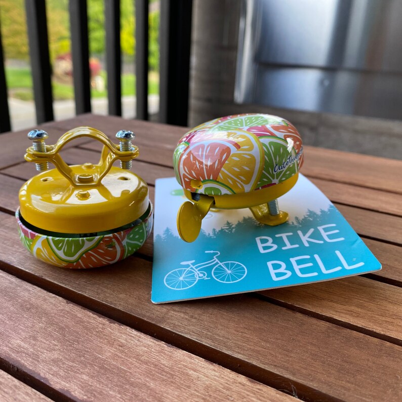 Citrus bike bell front and back view

cute bike accessories - bicycle accessory - gift for her - gift for bike rider - birthday gift - bicycle bell - Cute Things Seattle bike bell - cycling gifts, holiday gifts, wheelchair accessories