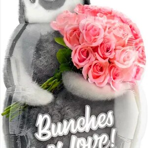 May include: A gray and white penguin balloon holding a bouquet of pink roses. The balloon has the text "Bunches of Love!" printed on it.