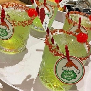 12 Resting Grinch Face Christmas cocktail drink toppers with matching pegs
