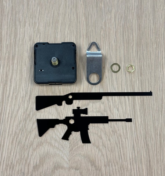 Gun shaped clock hands