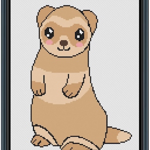 May include: A framed cross-stitch of a cartoon ferret. The ferret is in shades of brown and tan with pink cheeks and large black eyes. The background is white, and the frame is dark blue.