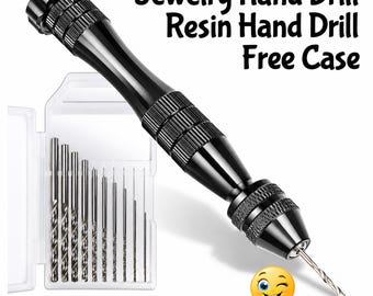 May include: A black manual hand drill for jewelry and resin work, featuring a textured grip and a chuck at the tip. It includes a clear plastic case containing ten metal drill bits of varying sizes. Text reads: Jewelry Hand Drill Resin Hand Drill Free Case.