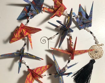 Blue and Orange String of Cranes