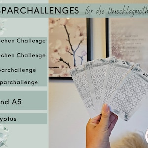Könnte beinhalten: Ein Satz von vier druckbaren Spar-Challenge-Karten mit floralem Design. Die Karten sind mit dem Text "50 Sparchallenge", "100 Sparchallenge", "26 Wochen Challenge" und "52 Wochen Challenge" beschriftet.