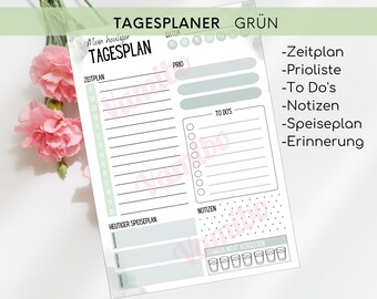 May include: A printable daily planner with a green and white color scheme. The planner includes sections for time, to-dos, notes, meals, and reminders. The text "TAGESPLANER GRÜN" is at the top of the page.