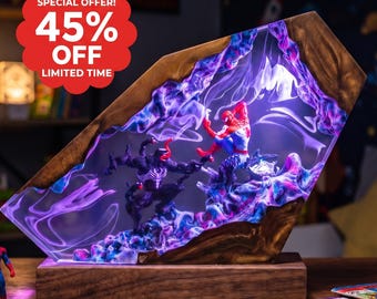 May include: A decorative lamp featuring a wooden base and a resin insert depicting a battle between Spider-Man and Venom. The resin contains swirling purple and blue smoke-like patterns, illuminated from within. A red badge reads 45% OFF.