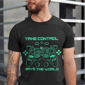 May include: A black t-shirt with a green graphic of a video game controller and the text "TAKE CONTROL SAVE THE WORLD".