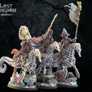 May include: Three miniature figures riding on intricately detailed, white seahorse mounts. The figures are dressed in red and gold armor, with one holding a flag. The figures are set on a base with a blue and white water effect.
