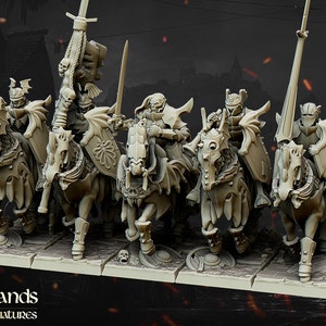 May include: A set of six unpainted miniature figures of knights on horseback, each with a sword and shield. The knights are wearing armor and helmets with wings. The horses are also armored and have wings. The miniatures are on square bases.