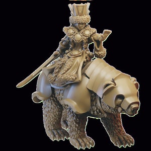 May include: A miniature figurine of a female warrior riding a bear. The warrior is wearing a crown and a fur-trimmed robe. The bear is armoured and has a fierce expression.