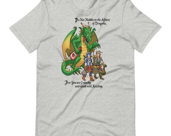 Könnte beinhalten: Ein graues T-Shirt mit einer grünen Drachenillustration und dem Text "Mische dich nicht in die Angelegenheiten der Drachen. Denn du bist knusprig und gut mit Ketchup."