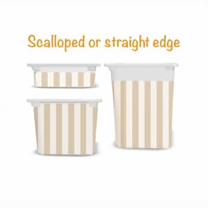 May include: Three containers with a striped design in beige and white, with a white lid. The text "Scalloped or straight edge" is in orange. The containers vary in size and shape.