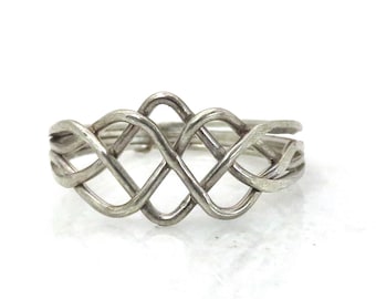 Vintage 800 silver 4-piece puzzle ring