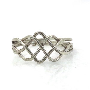 Vintage 800 silver 4-piece puzzle ring